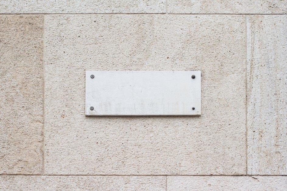 blank plaque on wall