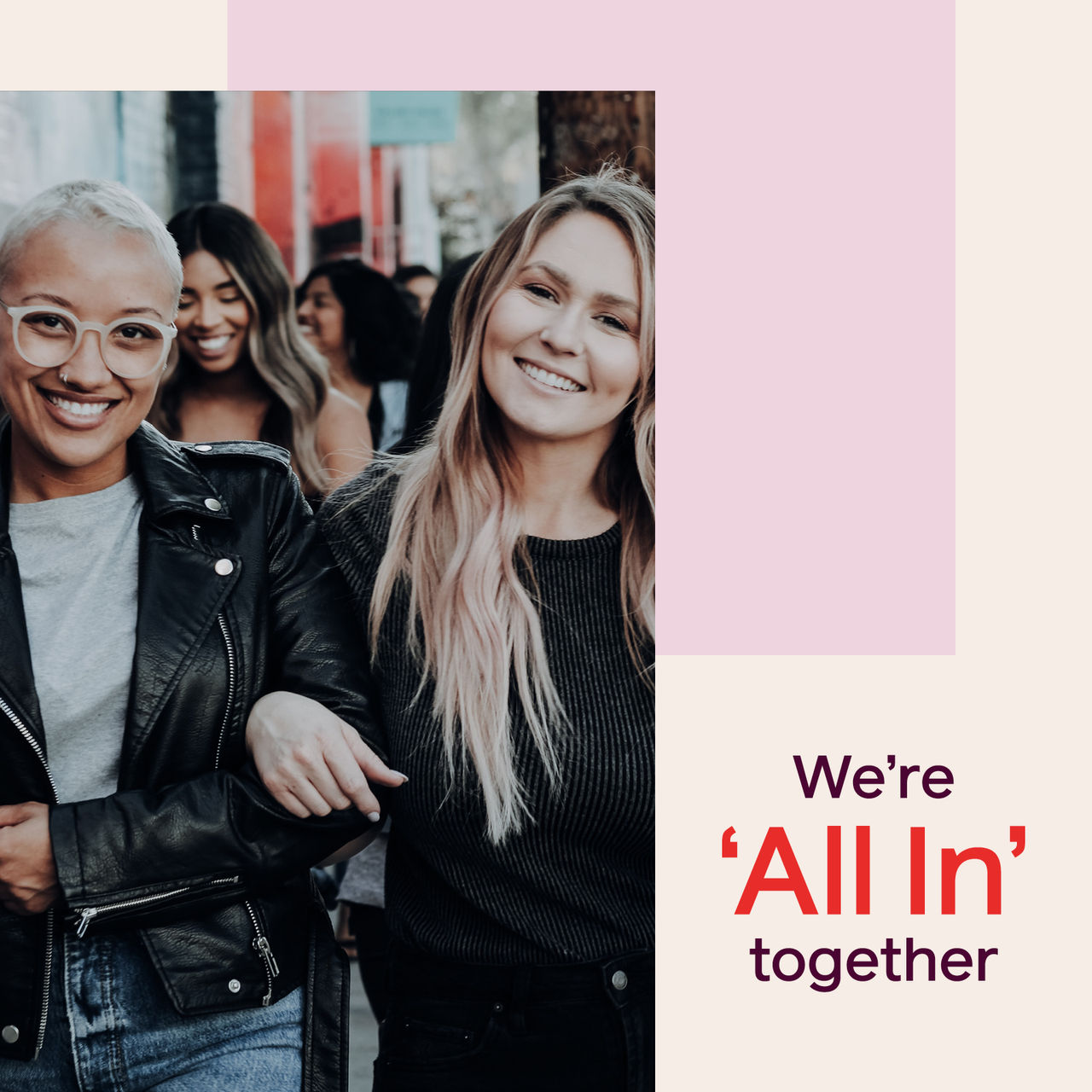 Two young women smiling, arms linked, with overlay text "we're 'All In' together"