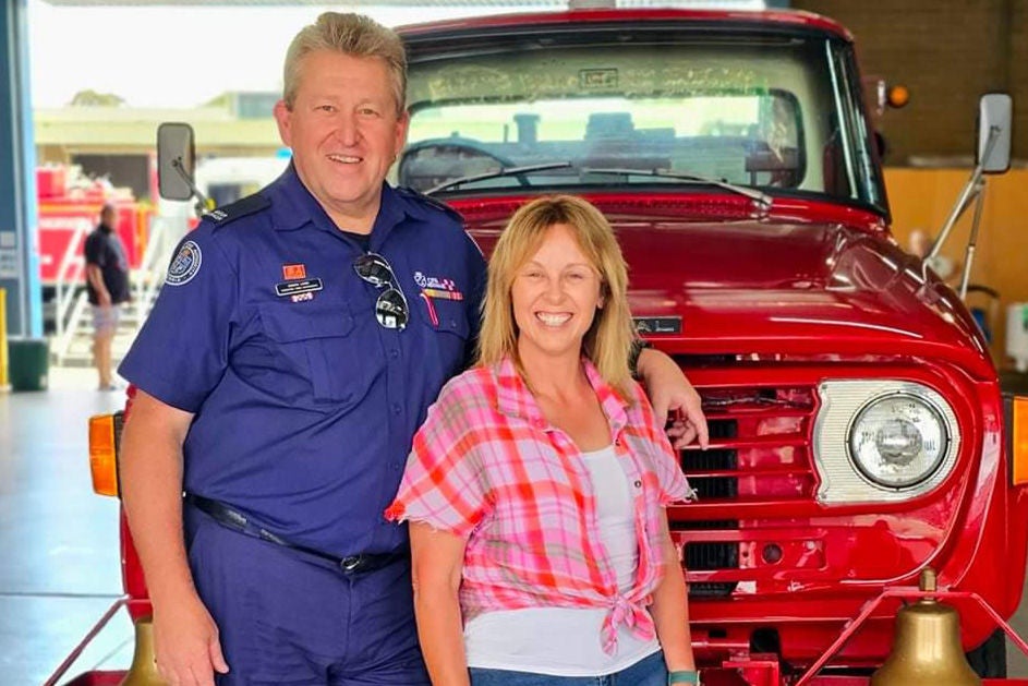 Maurice Blackburn client Simon with his wife standing in front of the car.
