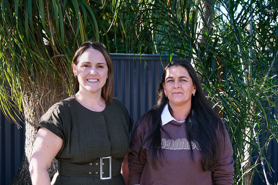 Maurice Blackburn lawyer Laura and her client Tracey standing side by side.
