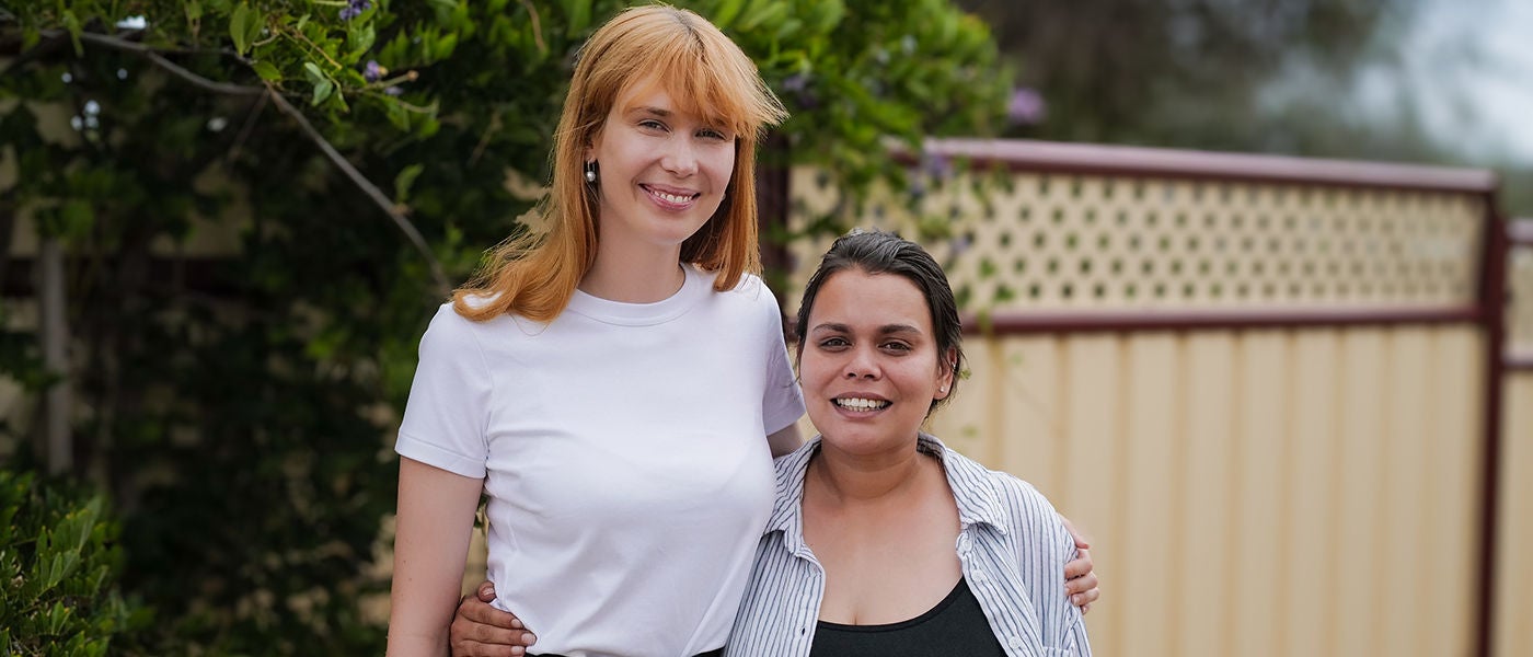 Maurice Blackburn Abuse lawyer Lily with client standing side by side.
