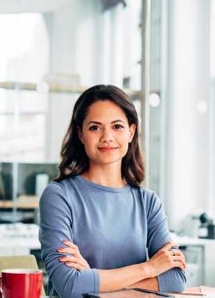 Women wearing blue shirt are happy with her careers