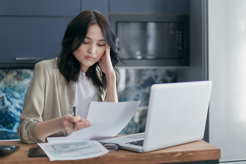 Woman checking her insurance cover documents