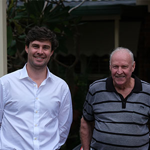 Maurice Blackburn lawyer Liam with client Graham standing side by side.