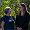 Maurice Blackburn lawyer Grace and her client Wendy smiling at each other 